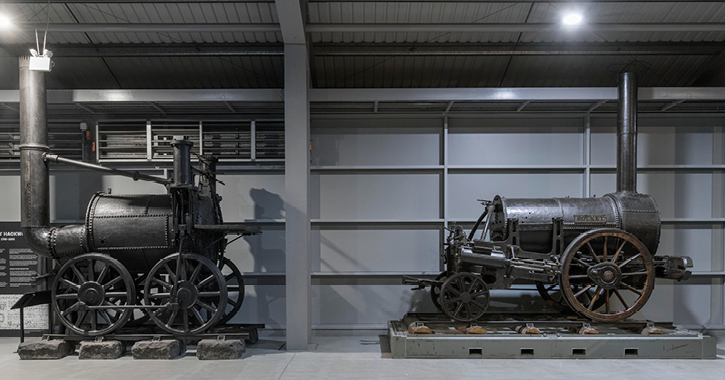 Stephenson's Rocket next to Sans Pareil, another Rainhill Trials loco, it its new display location at Locomotion, Shildon. Credit NRM